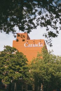 brown building wall with signage